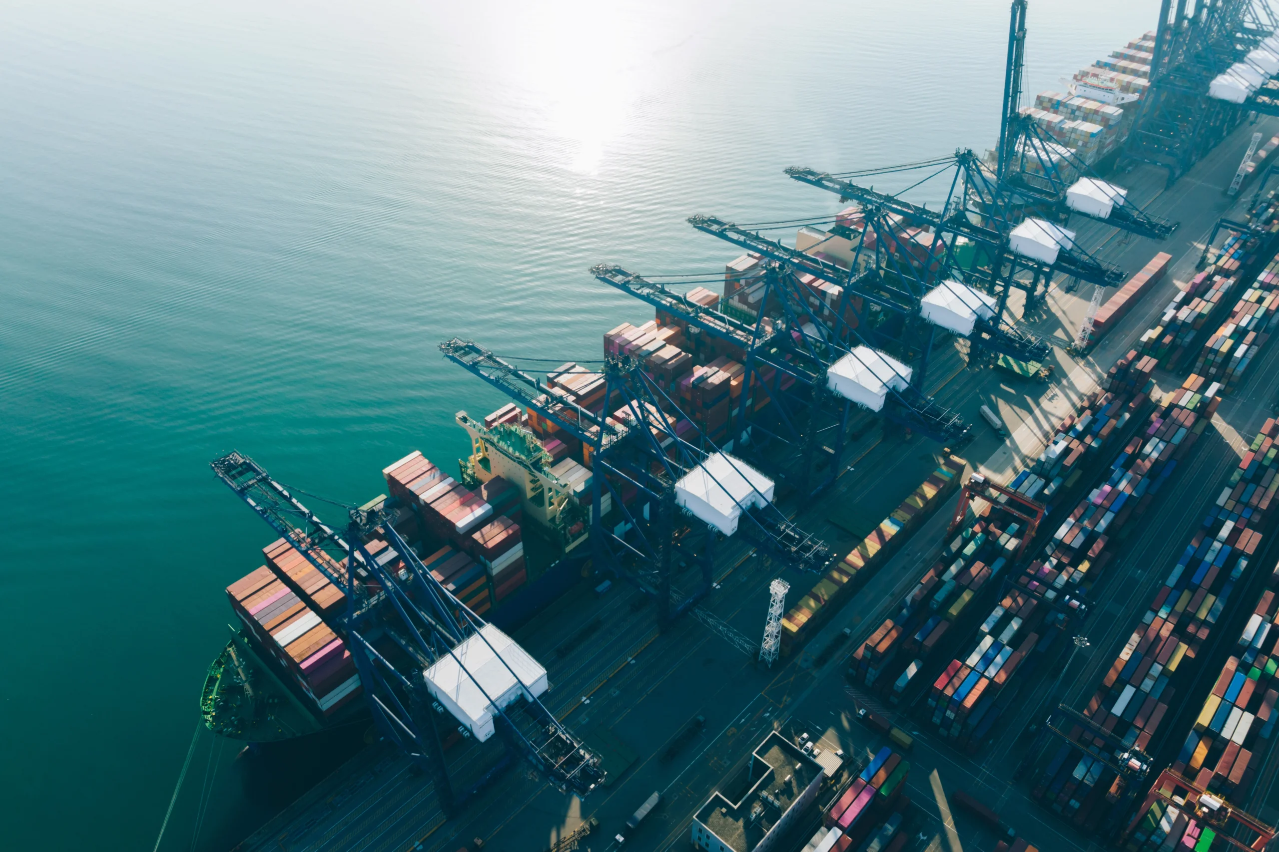 cargo-ship-being-loaded-with-shipping-containers-2026-03-16-02-11-50-utc