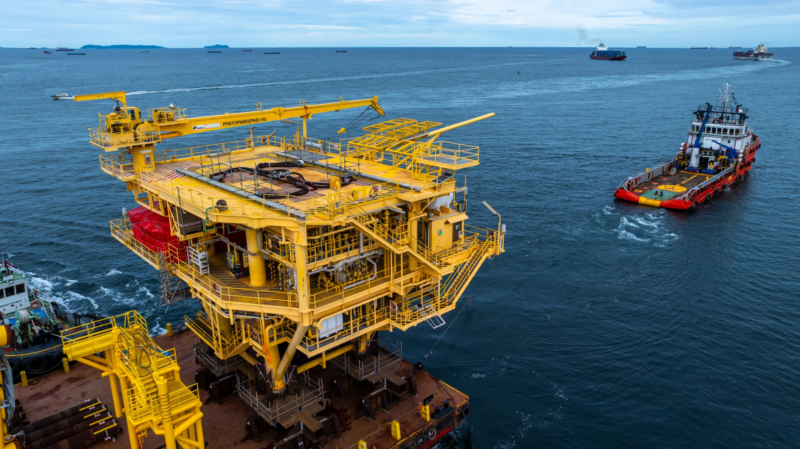 offshore-platform-and-vessels-at-sea-under-cloudy-2026-03-25-09-37-35-utc (1)